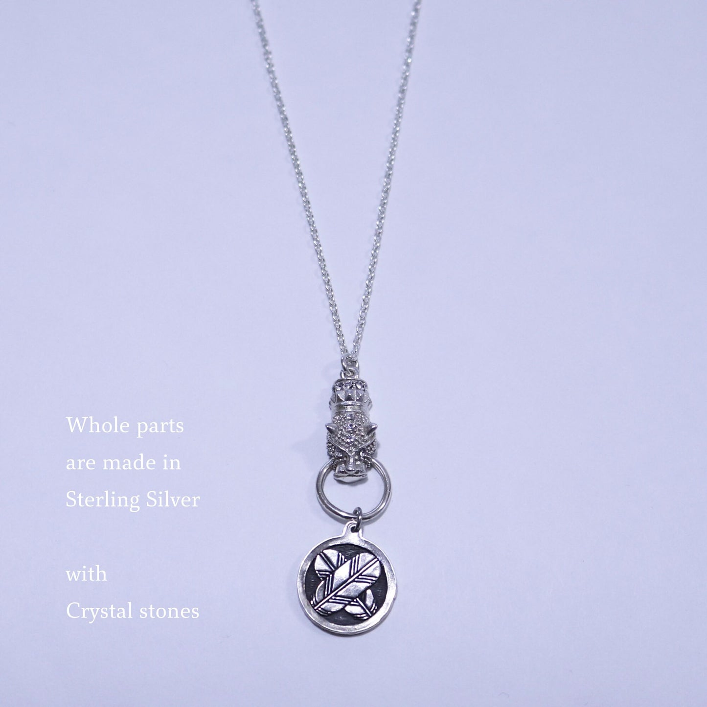 Kamon Jaguar Necklace - Crossing Hawk Feathers in a circle