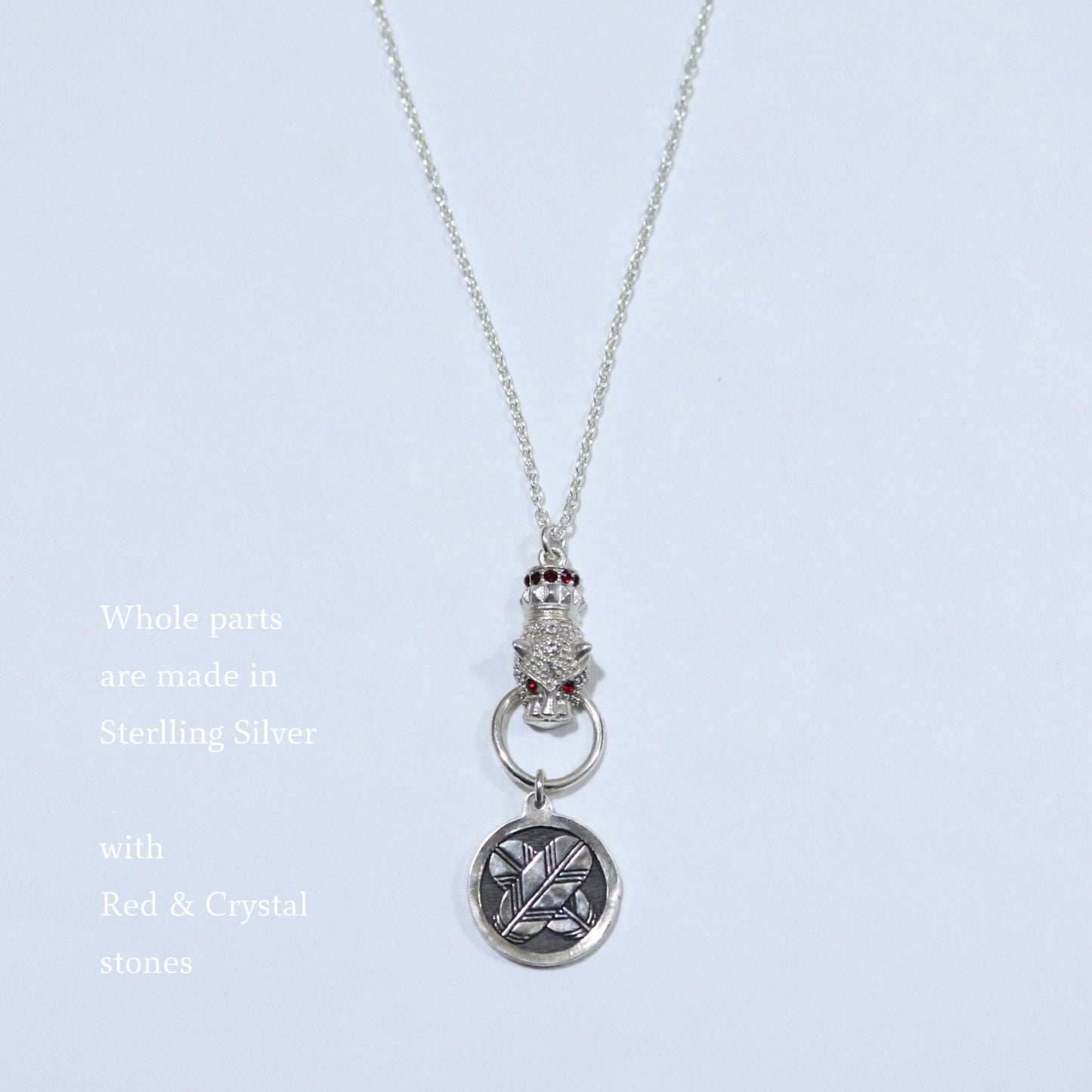 Kamon Jaguar Necklace - Crossing Hawk Feathers in a circle