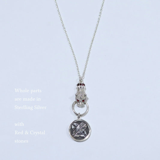 Kamon Jaguar Necklace - Crossing Hawk Feathers in a circle