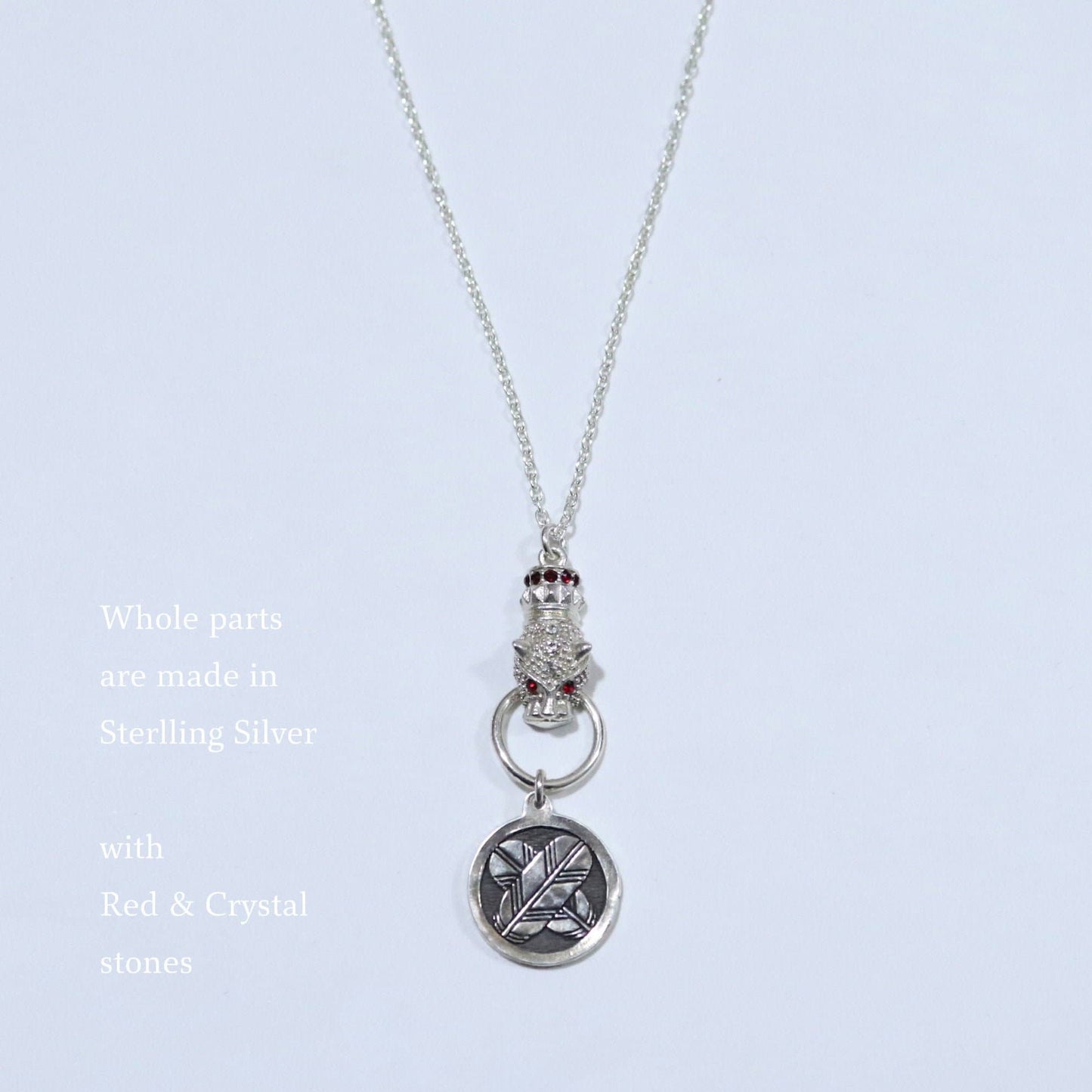 Kamon Jaguar Necklace - Crossing Hawk Feathers in a circle