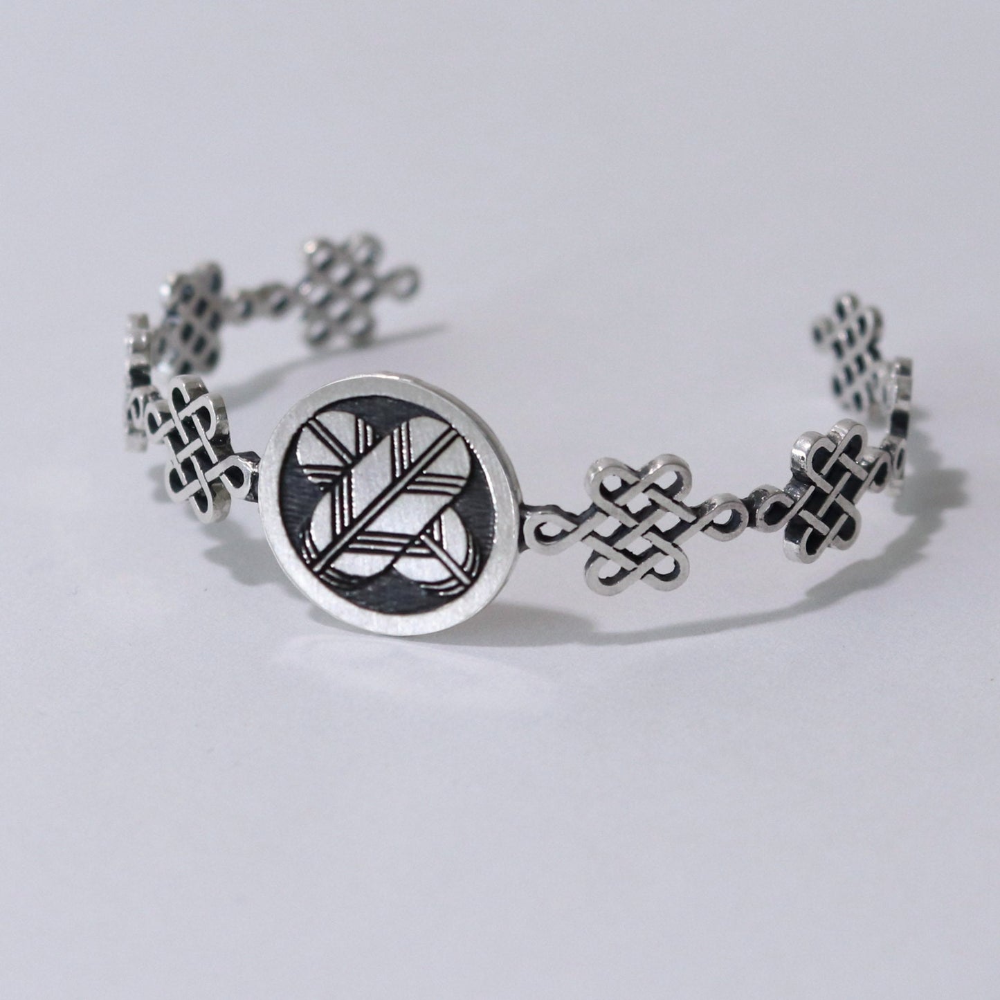 Bangle /Crossing Hawk Feathers in a circle / Kamon / Japanese Mon / Sterling Silver