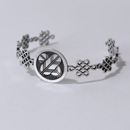 Bangle /Crossing Hawk Feathers in a circle / Kamon / Japanese Mon / Sterling Silver
