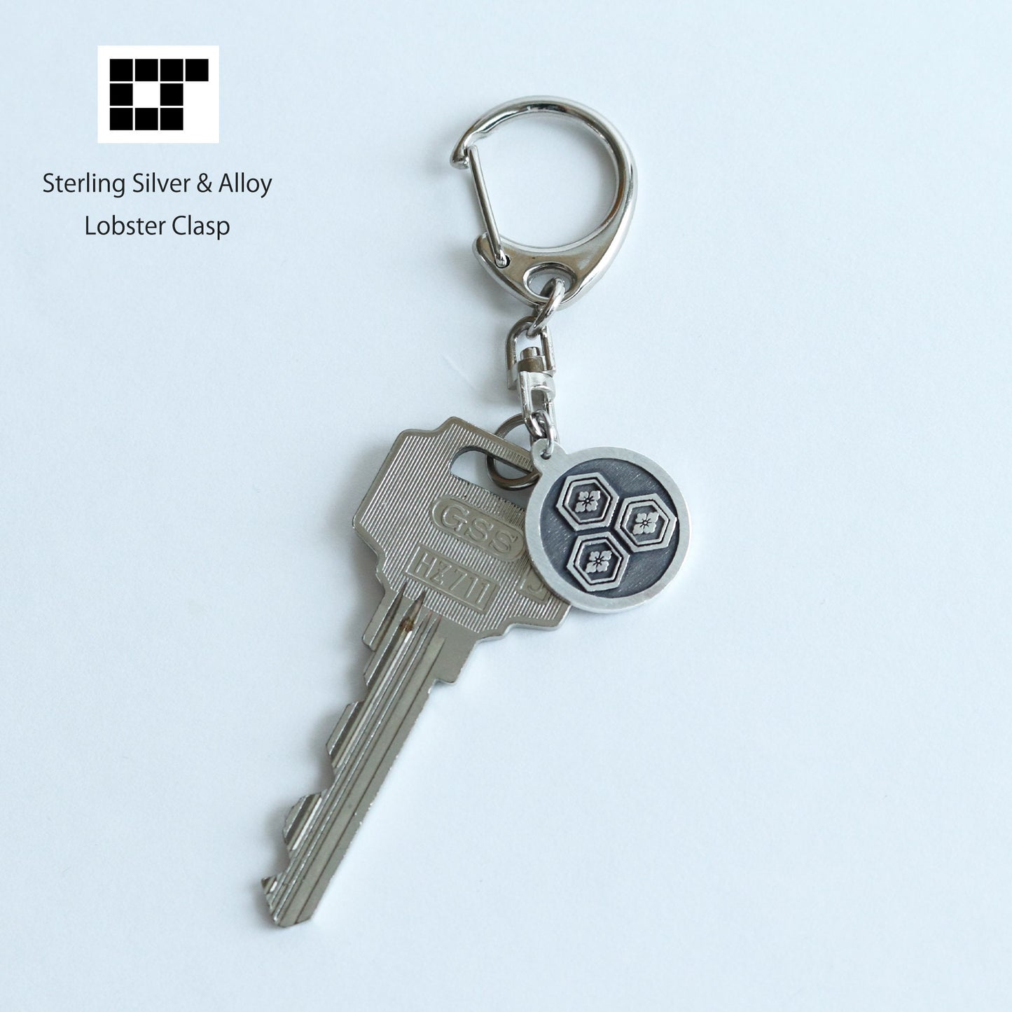 Key chain - Three of Hanabishi in hexagon in a circle - 丸に三つ盛り亀甲に花菱