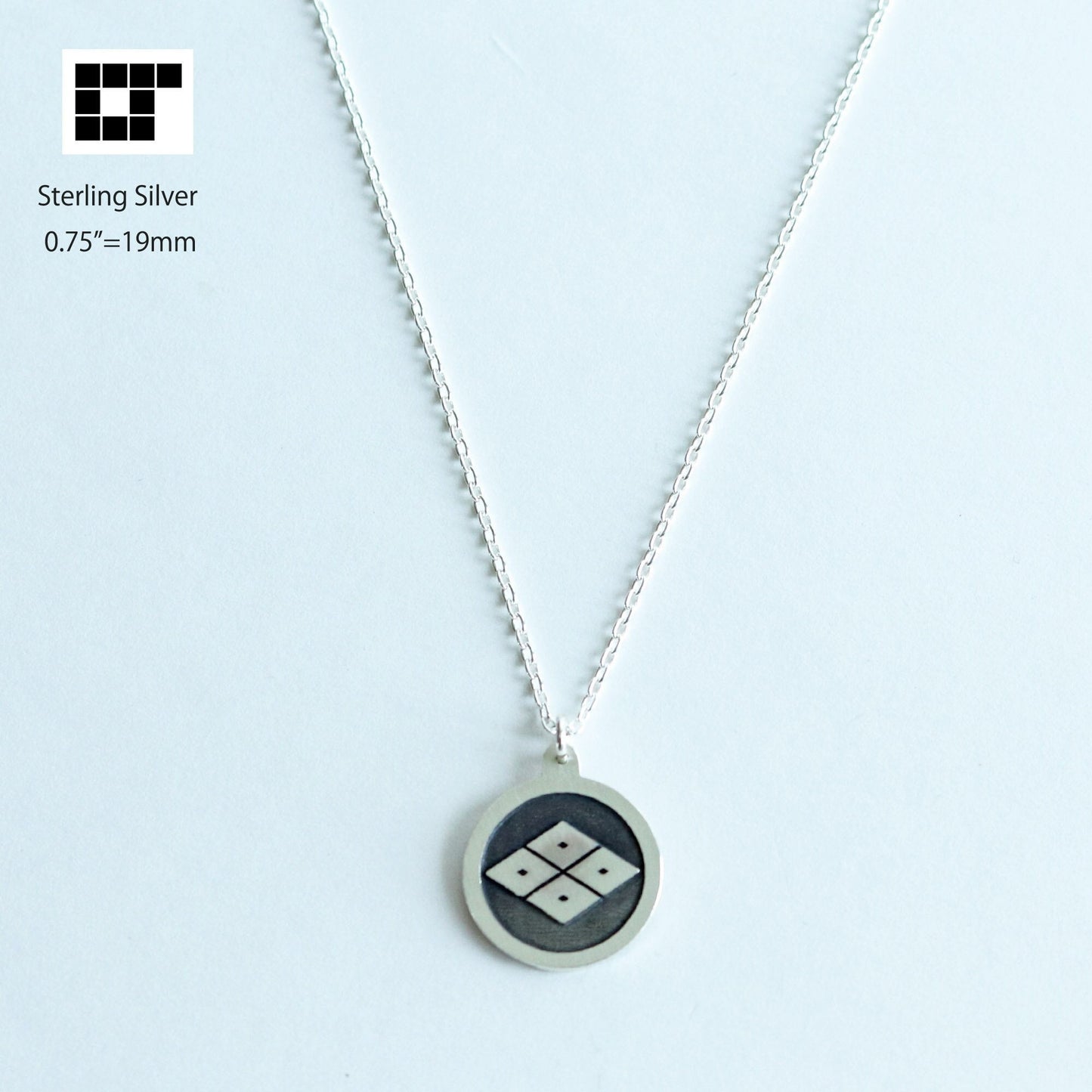 Pendant - Four-eyed Lozenge in a circle
