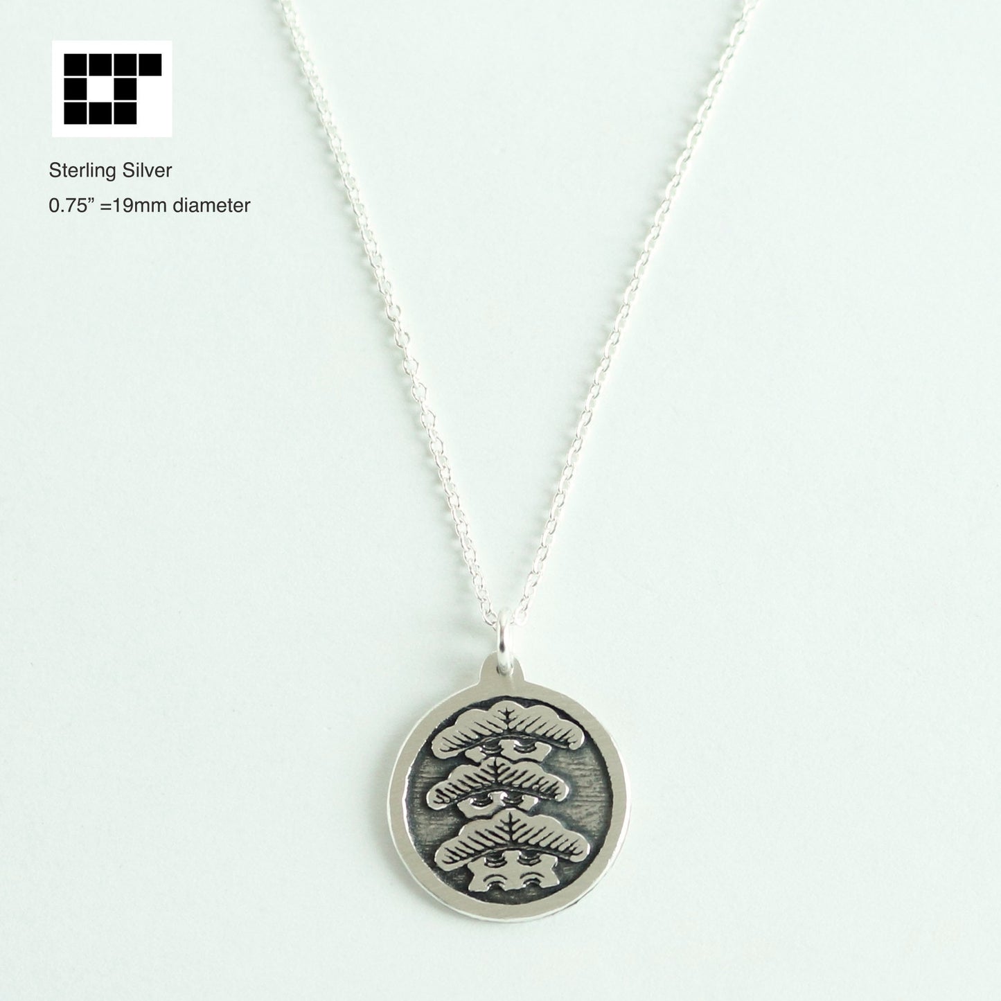 Tilting to Left Three-story Pine Tree in a circle - Japanese Clan Crest - Kamon