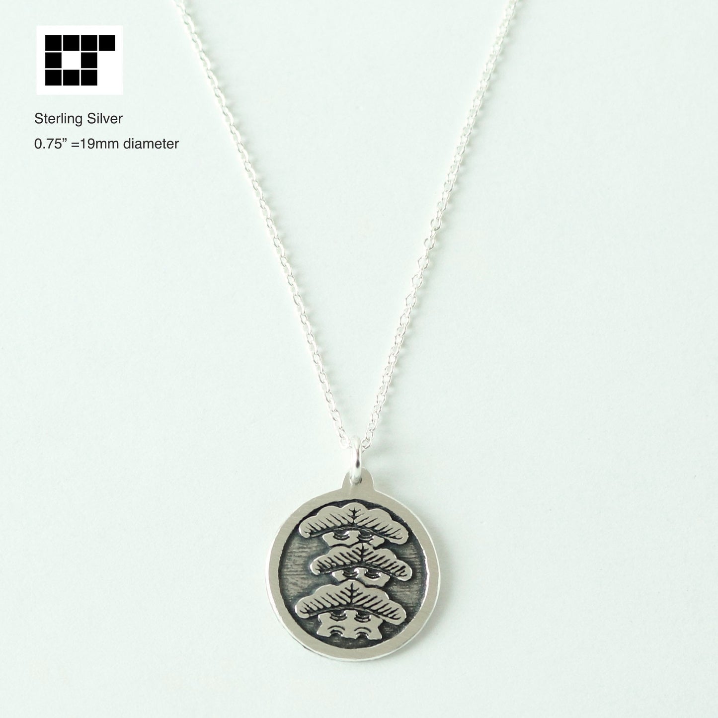 Tilting to Right Three-story Pine Tree in a circle - Japanese Clan Crest - Kamon