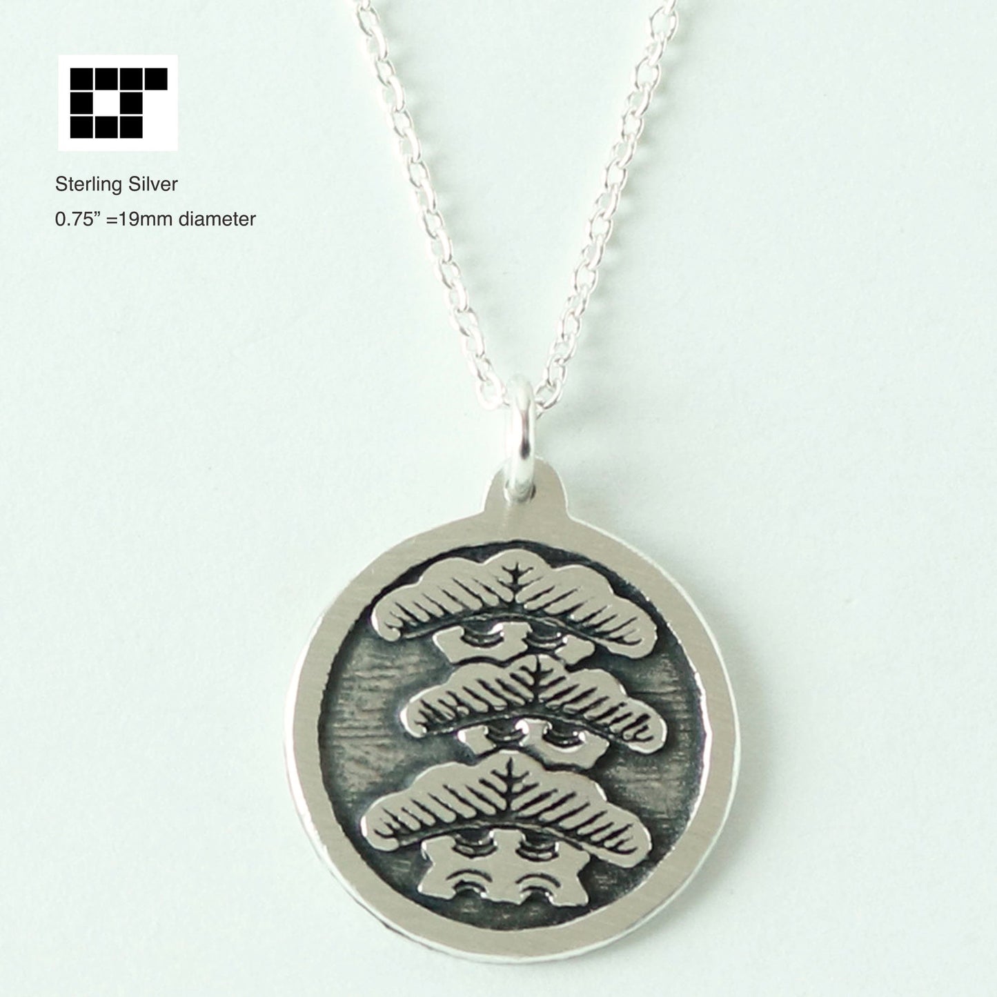 Tilting to Right Three-story Pine Tree in a circle - Japanese Clan Crest - Kamon